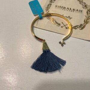 Shiraleah Chicago Gold Bangle Bracelet with Navy‎ Blue Tassel and Charm Detail